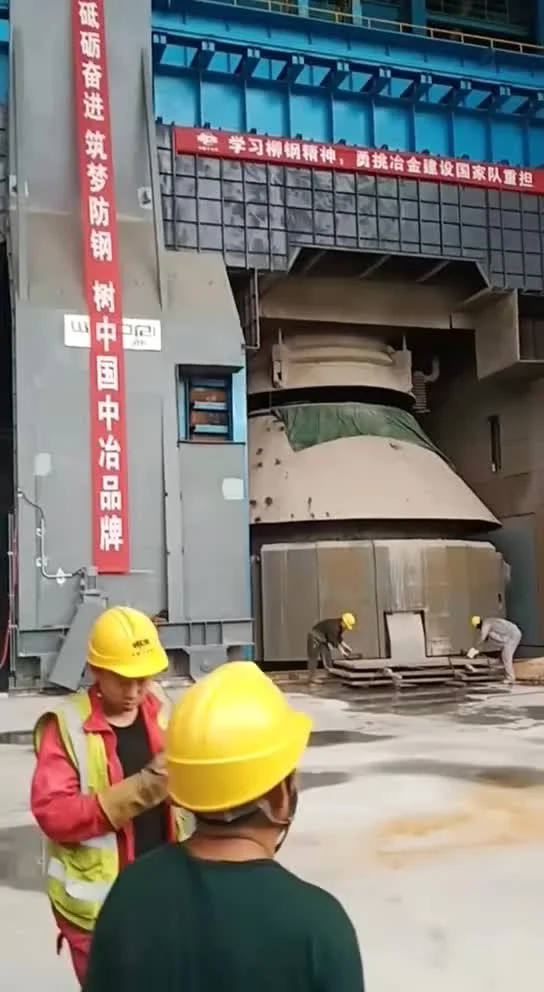Workers wearing safety footwear in an industrial facility — ESD shoes or heel grounders provide the ground path