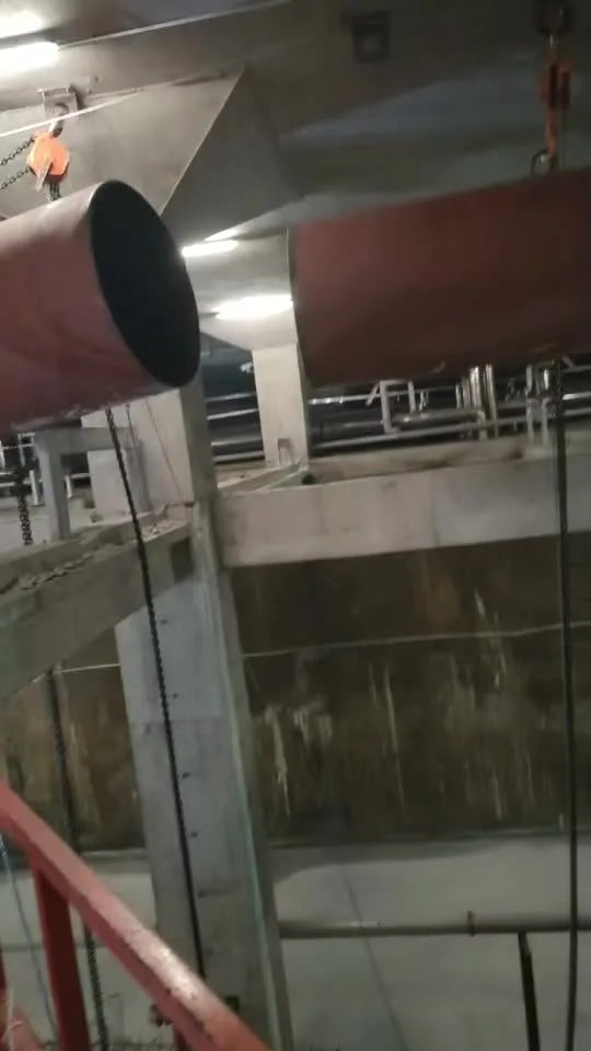 Worker in protective workwear inside an industrial facility
